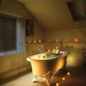 alt="Candle Lit Free Standing Bath Tub"